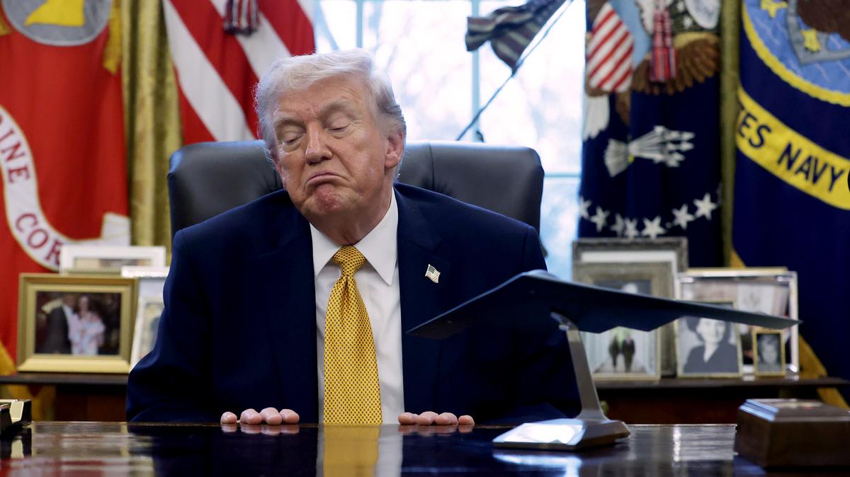 U.S. President Donald Trump speaks to the media after signing a document during a White House signing ceremony in the Oval Office of the White House on March 16, 2026 in Washington, DC. (Alex Wong/Getty Images/TNS)