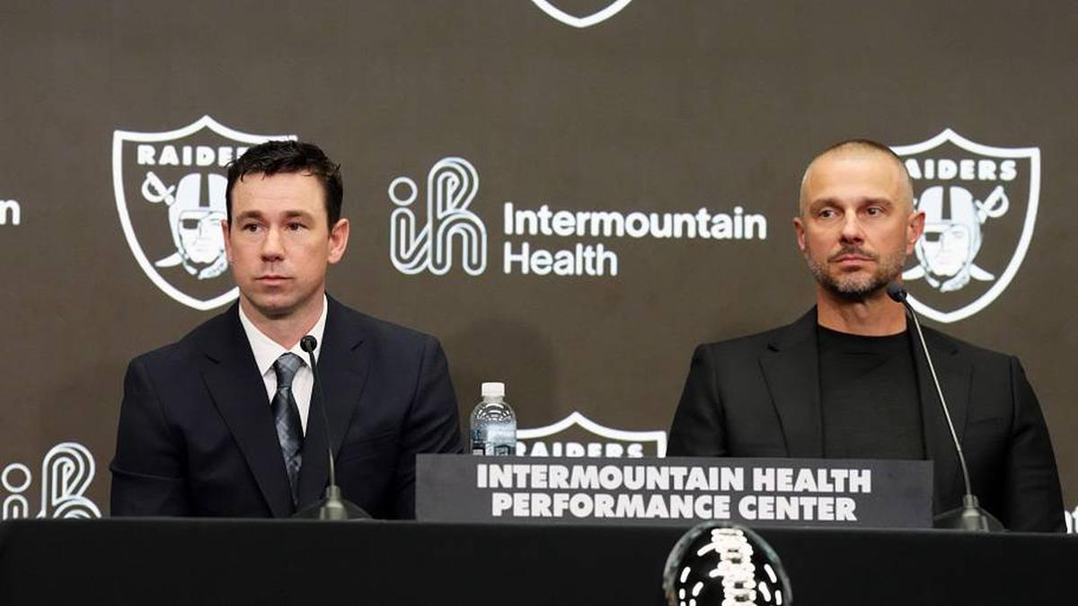  Feb 10, 2026; Henderson, NV, USA; Las Vegas Raiders coach Klint Kubiak (left) and general manager John Spytek at introductory press conference at Intermountain Health Performance Center. Mandatory Credit: Kirby Lee-Imagn Images | Kirby Lee-Imagn Images 
