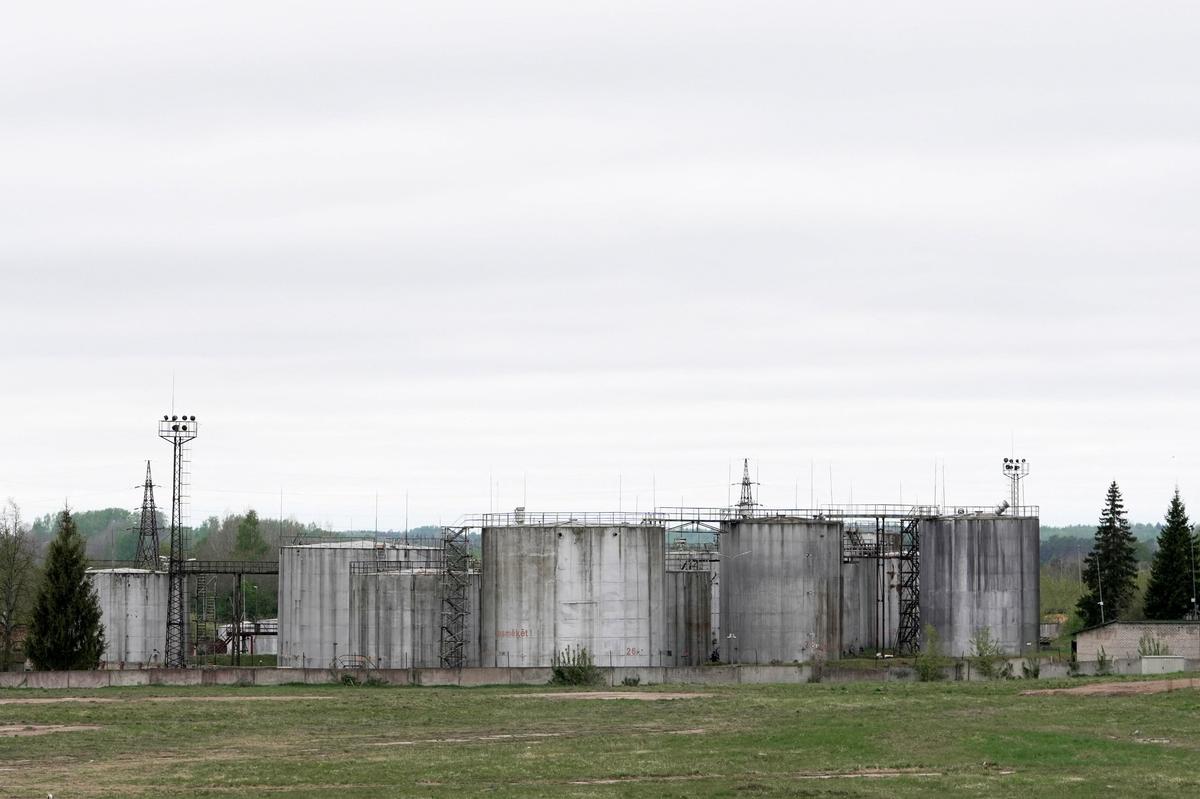 Oil tanks at the site where drones crashed at a storage facility in Rezekne, Latvia, May 7, 2026. REUTERS/Janis Laizans