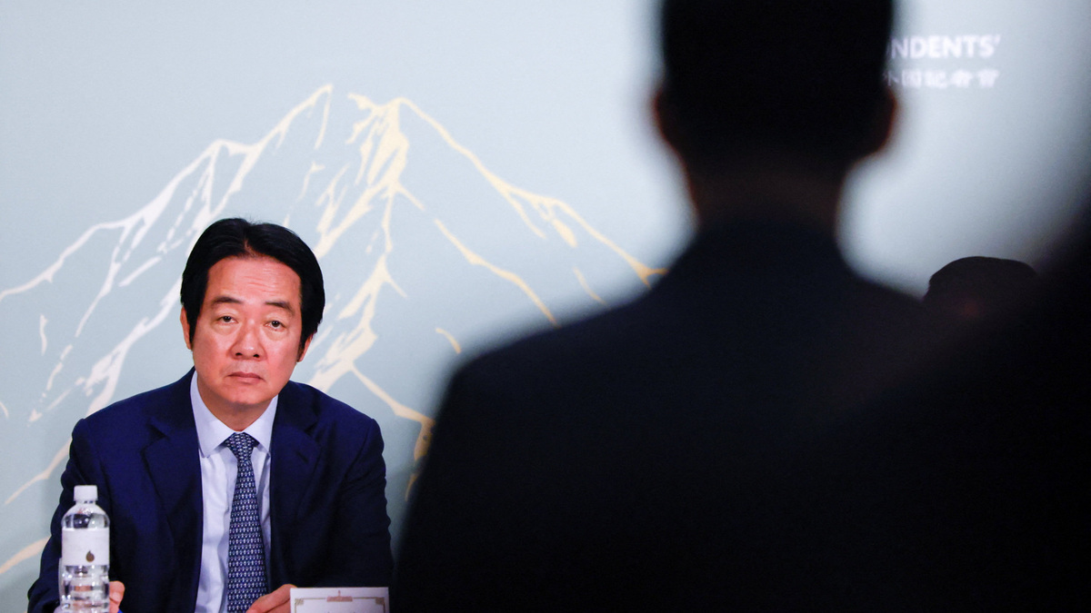 Taiwan President Lai Ching-te takes notes as a reporter asks a question during a press conference with the Taiwan Foreign Correspondents’ Club in Taipei, Taiwan, June 18, 2026. REUTERS/Ann Wang