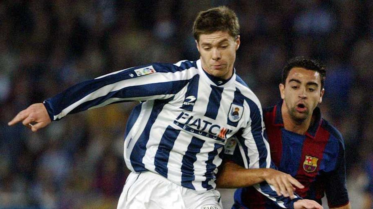  Xabi Alonso (left) is a product of Real Sociedad's academy. | Rafa Rivas/AFP/Getty Images 