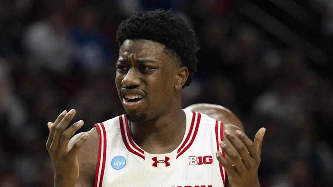  Mar 19, 2026; Portland, OR, USA; Wisconsin Badgers guard Braeden Carrington (0) and guard John Blackwell (25) react during the second half of a first round game of the men's 2026 NCAA Tournament against the High Point Panthers at Moda Center. Mandatory Credit: Troy Wayrynen-Imagn Images | Troy Wayrynen-Imagn Images 