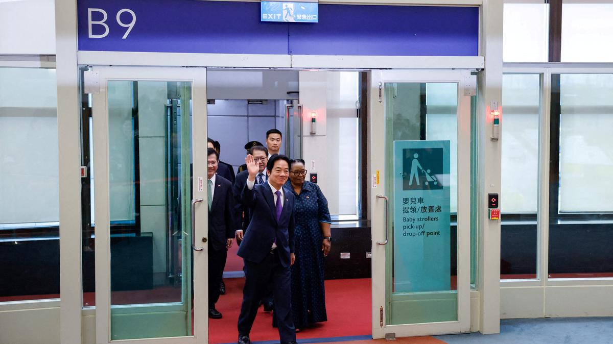 Taiwan President Lai Ching-te, accompanied by Deputy Prime Minister of the Kingdom of Eswatini Thulisile Dladla, arrives at a press conference upon returning from Eswatini, at Taoyuan International Airport, in Taoyuan, Taiwan, May 5, 2026. REUTERS/Ann Wang