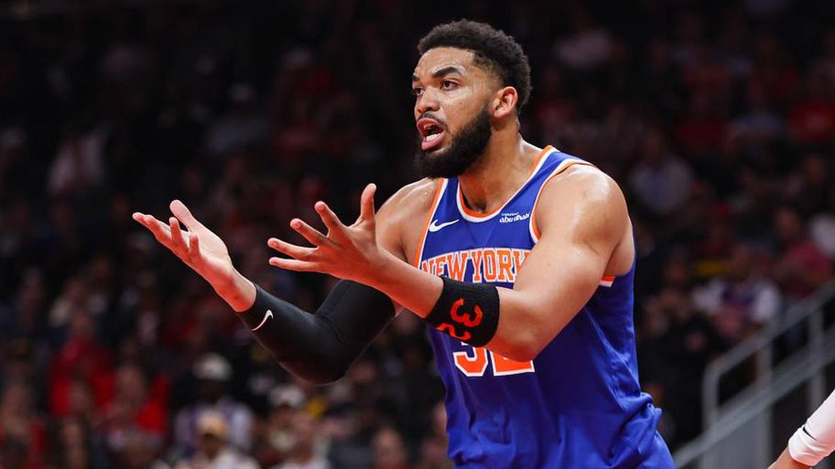  Apr 30, 2026; Atlanta, Georgia, USA; New York Knicks center Karl-Anthony Towns (32) reacts to a call against the Atlanta Hawks in the second quarter during game six of the first round of the 2026 NBA Playoffs at State Farm Arena. | Brett Davis-Imagn Images 