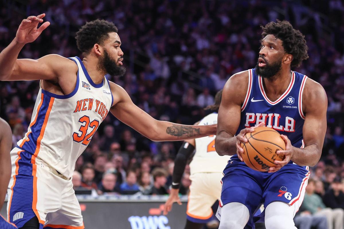  Philadelphia 76ers center Joel Embiid looks to shoot past New York Knicks center Karl-Anthony Towns in the third quarter at Madison Square Garden. Wendell Cruz-Imagn Images