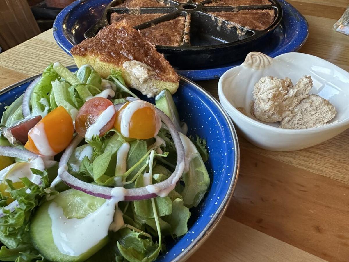  Confession. I ate three wedges of the cast-iron cornbread with clover honey BEFORE downing my filet mignon at Campfire Grill. Photo credit: Cathy Bennett Kopf 