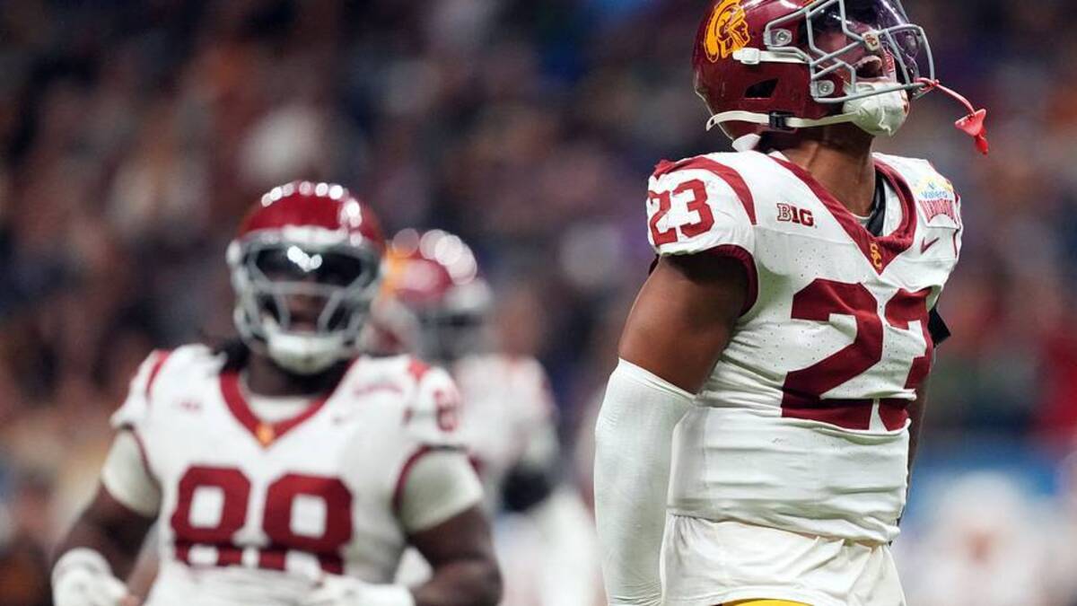  Dec 30, 2025; San Antonio, TX, USA; Southern California Trojans linebacker Desman Stephens II (23) celebrates against the TCU Horned Frogs in the second half during the Alamo Bowl at Alamodome. Mandatory Credit: Kirby Lee-Imagn Images | IMAGN IMAGES via Reuters Connect 