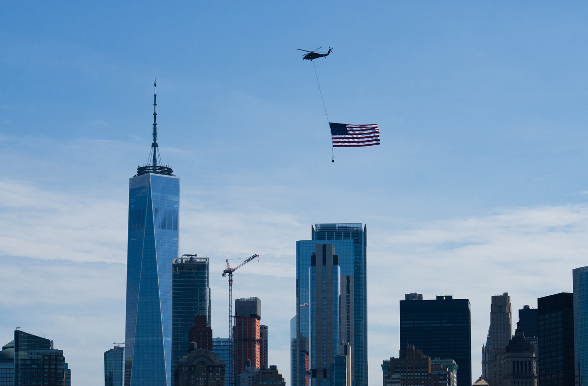 A helicopter flies above New York for the boat parade July 4, 2026. America celebrates the 250th anniversary of its independence today, with people from one end of the country to the other marking the milestone with fireworks, parades and concerts. (Juan Arredondo/The New York Times)