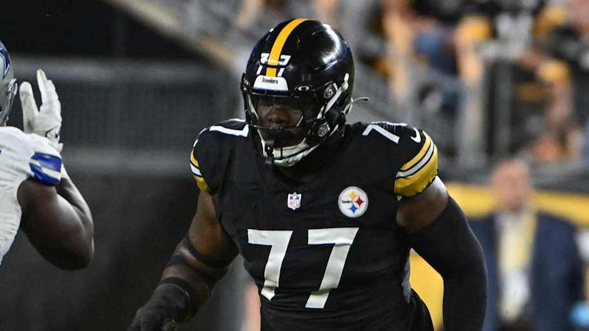  Oct 6, 2024; Pittsburgh, Pennsylvania, USA; Pittsburgh Steelers offensive tackle Broderick Jones (77) pass blocks during the first quarter against the Dallas Cowboys at Acrisure Stadium. Mandatory Credit: Barry Reeger-Imagn Images | Barry Reeger-Imagn Images 