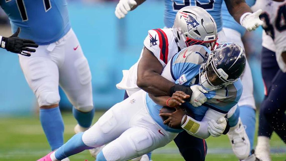  Tennessee Titans quarterback Cam Ward (1) is sacked by New England Patriots defensive end Milton Williams (97) during the third quarter at Nissan Stadium in Nashville, Tenn., Sunday, Oct. 19, 2025. | Andrew Nelles / The Tennessean / USA TODAY NETWORK via Imagn Images 