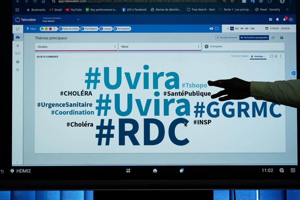 Dr. Bavon Tangunza Ngunga, who counters health misinformation, shows a screen during a demonstration of infodemic applications at the WHO (World Health Organization) headquarters, in Kinshasa, Democratic Republic of Congo February 23, 2026. REUTERS/Arsene Mpiana