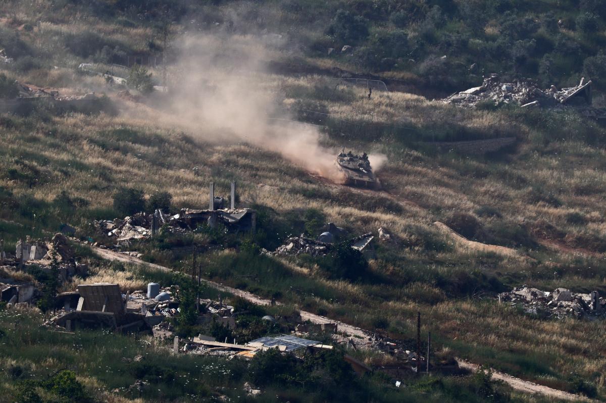 An Israeli tank maneuvers in southern Lebanon, as seen from northern Israel, May 31, 2026. REUTERS/Amir Cohen