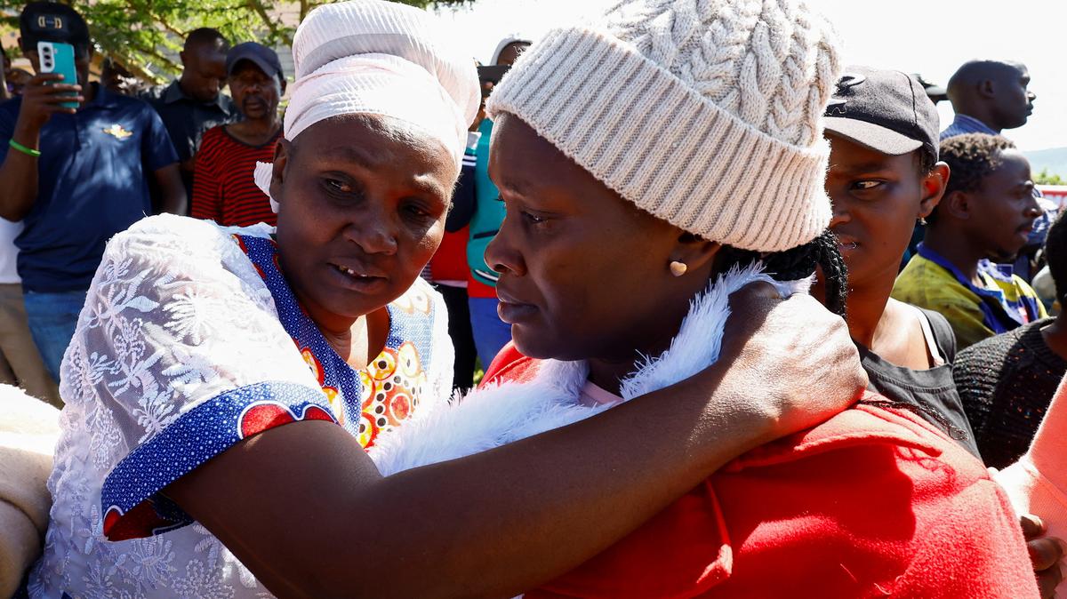 Parents and residents react as they gather at the Utumishi Girls' Academy Senior School following an overnight fire in a dormitory at the facility in Gilgil, Nakuru county, Kenya May 28, 2026. REUTERS/Thomas Mukoya