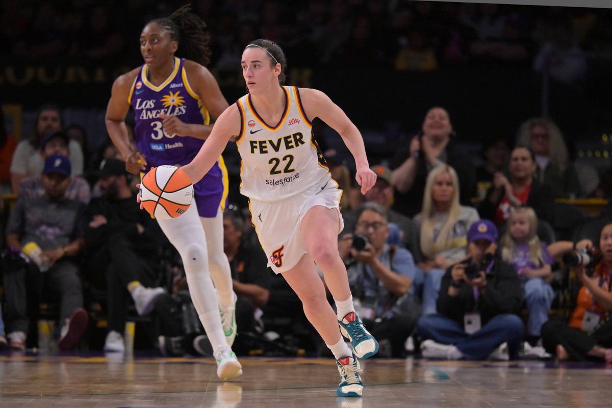  May 13, 2026; Los Angeles, California, USA; Indiana Fever guard Caitlin Clark (22) handles the ball against the Los Angeles Sparks at Crypto.com Arena. Mandatory Credit: Jayne Kamin-Oncea-Imagn Images 