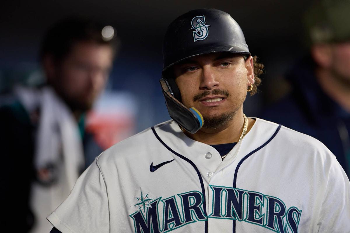  Seattle Mariners first baseman Josh Naylor returns to the dugout after scoring the fourth inning at T-Mobile Park. Richard Dizon-Imagn Images