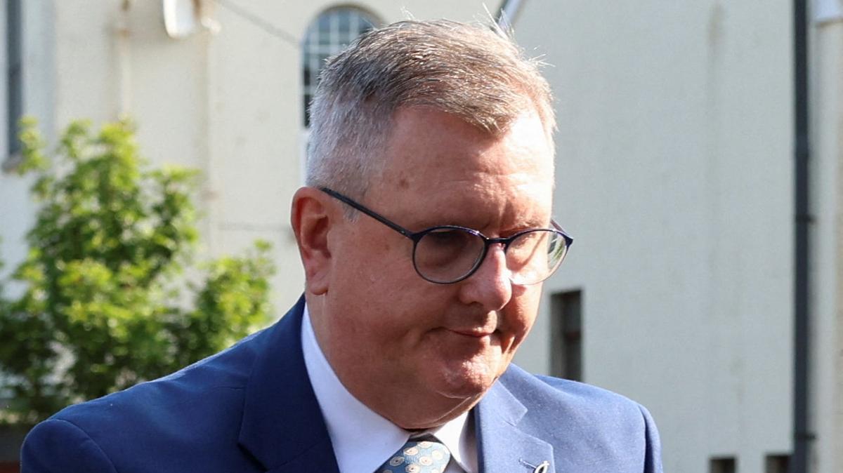Jeffrey Donaldson, former leader of the Democratic Unionist Party (DUP), charged with historical sex offences, arrives at Newry Courthouse as he appears for trial in Newry, Northern Ireland, May 27, 2026. REUTERS/Cathal McNaughton