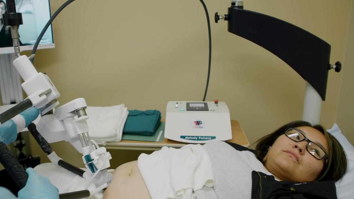 Technician Shawna Piche assists patient Trina Lobillard as she receives a remotely controlled ultrasound in 2018 in Stony Rapids, Saskatchewan. (Virtual Health Hub/TNS)