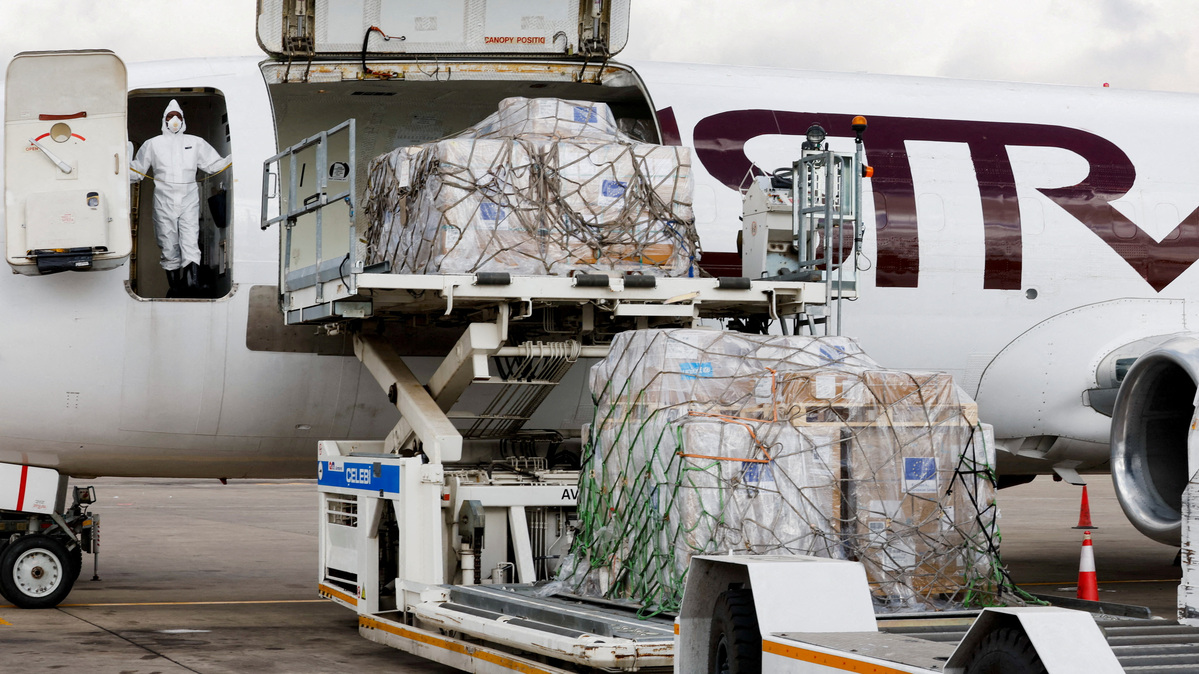 FILE PHOTO: A European Commission Civil Protection and Humanitarian Aid Operations (ECHO) crew member dressed in Personal Protective Equipment (PPE) stands as essential medical supplies and emergency kits are loaded on an aircraft to support the affected regions in Bunia, Ituri province, amidst the Ebola outbreak in the Democratic Republic of Congo, at the Jomo Kenyatta International Airport (JKIA) in Nairobi, Kenya, June 4, 2026. REUTERS/Monicah Mwangi/File Photo