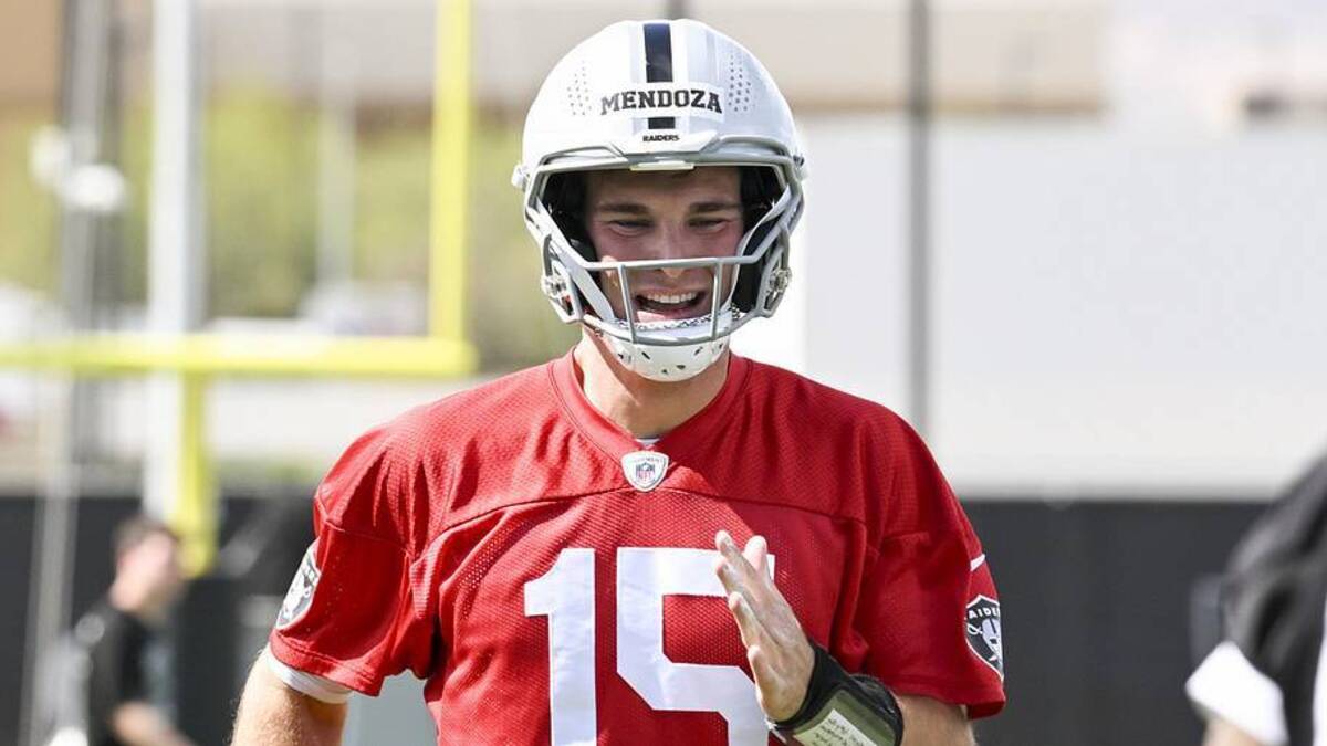  Jun 3, 2026; Henderson, NV, USA; Las Vegas Raiders quarterback Fernando Mendoza (15) warms up during organized team activities at Intermountain Health Performance Center. Mandatory Credit: Candice Ward-Imagn Images | Candice Ward-Imagn Images 