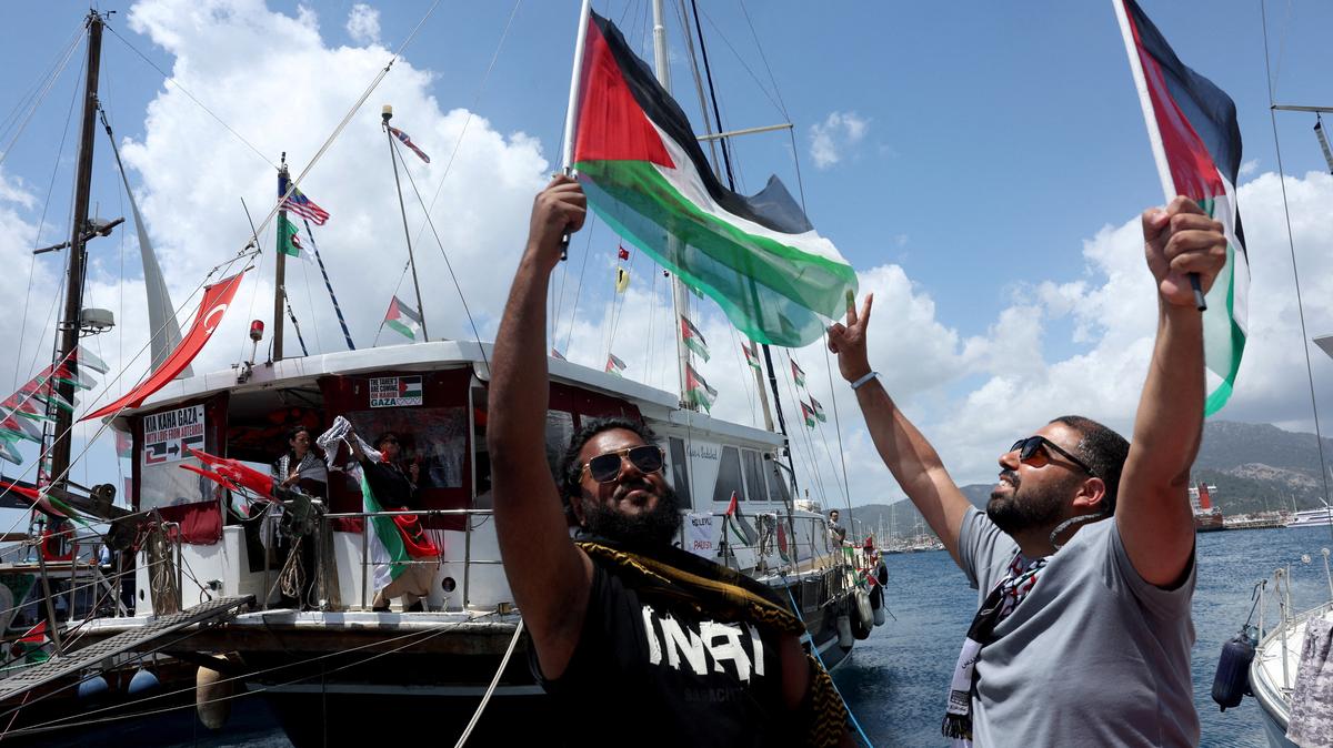 Activists from the Global Sumud Flotilla, aiming to reach Gaza and break Israel’s naval blockade, gather at a port before their departure in the southern Turkish resort of Marmaris, Turkey, May 14, 2026. REUTERS/Dilara Senkaya