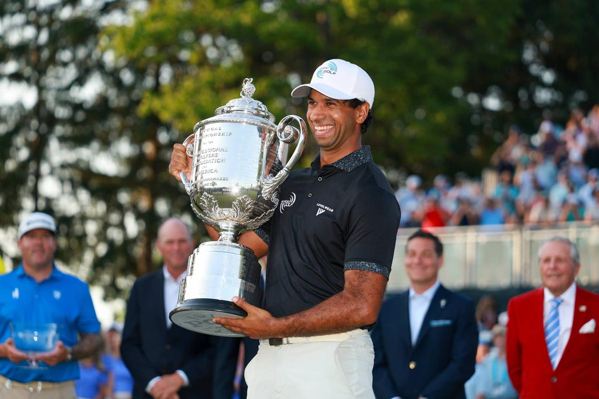  Aaron Rai raises the Wanamaker Trophy after winning the PGA Championship at Aronimink Golf Club on Sunday, May 17, 2026, in Newtown Square, Pennsylvania. Photo by Scott Taetsch/PGA of America