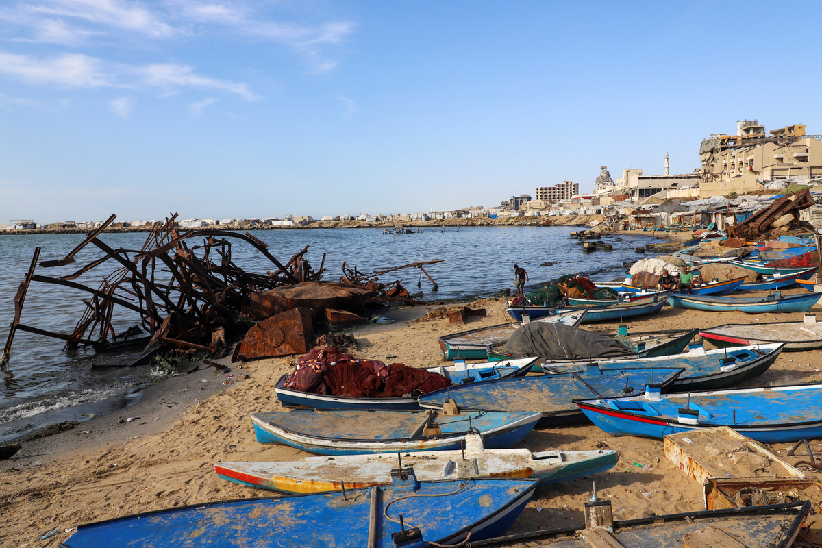 Skiffs used by Palestinian fishermen are docked on the beach in Gaza City, June 3, 2026. REUTERS/Ebrahim Hajjaj
