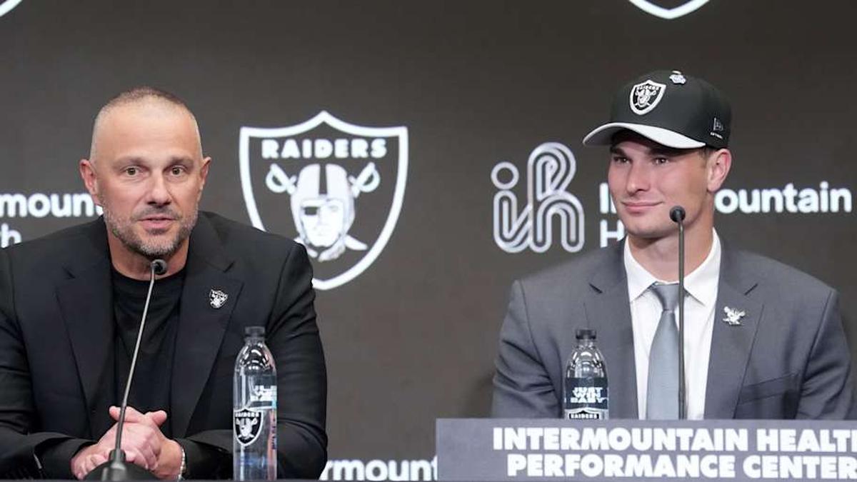  Apr 24, 2026; Henderson, NV, USA; Las Vegas Raiders quarterback Fernando Mendoza (right) and general manager John Spytek at introductory press conference at Intermountain Health Performance Center after being selected as the No. 1 pick in the 2026 NFL Draft. Mandatory Credit: Kirby Lee-Imagn Images | Kirby Lee-Imagn Images 