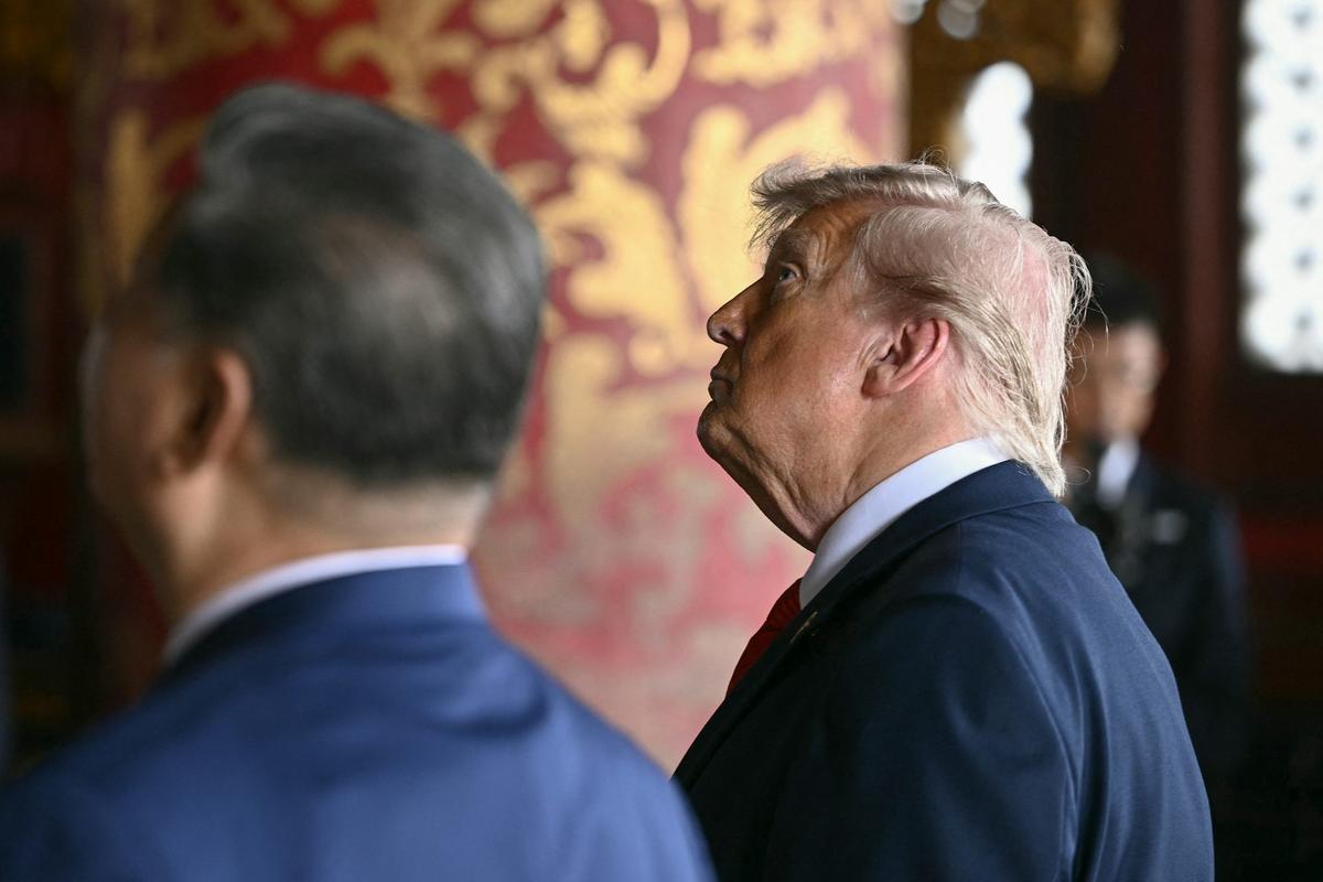  China's President Xi Jinping and U.S. President Donald Trump at the Temple of Heaven in Beijing on May 14, 2026. Brendan Smialowski/ AFP via Getty Images 