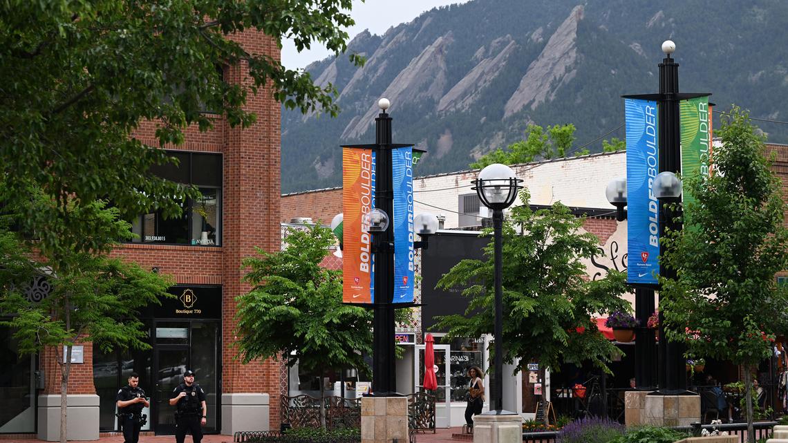 Boulder police officers patrol the Pearl Street Mall near the scene of a Molotov cocktail attack on demonstrators the day before, on Monday, June 2, 2025, in Colorado. (Helen H. Richardson/The Denver Post/TNS)