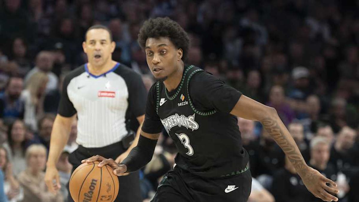  Mar 20, 2026; Minneapolis, Minnesota, USA; Minnesota Timberwolves forward Jaden McDaniels (3) dribbles the ball against the Portland Trail Blazers in the second half at Target Center. | Jesse Johnson-Imagn Images 