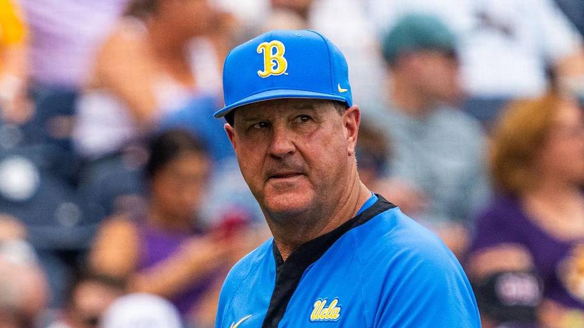  Jun 16, 2025; Omaha, Neb, USA; UCLA Bruins head coach John Savage walks off the field before the game against the LSU Tigers at Charles Schwab Field. Mandatory Credit: Dylan Widger-Imagn Images | Dylan Widger-Imagn Images 