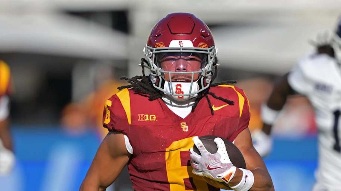  Sep 6, 2025; Los Angeles, California, USA; USC Trojans wide receiver Makai Lemon (6) runs down field for a touchdown on a pass play during the first half against the Georgia Southern Eaglesat Los Angeles Memorial Coliseum. Mandatory Credit: Jayne Kamin-Oncea-Imagn Images | Jayne Kamin-Oncea-Imagn Images 