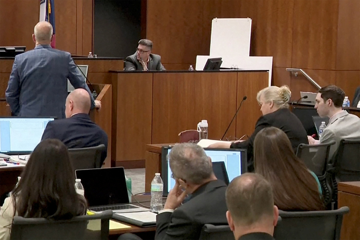 Tyler Robinson, the man accused of killing conservative activist Charlie Kirk, sits beside defense lawyer Kathryn Nester during a preliminary court hearing as Utah County prosecutor Chad Grunander questions David Hull, an investigator with the Utah Department of Safety, in Provo, Utah, U.S. July 6, 2026 in a still image from video.  Utah Courts and KSL TV/Pool via REUTERS.