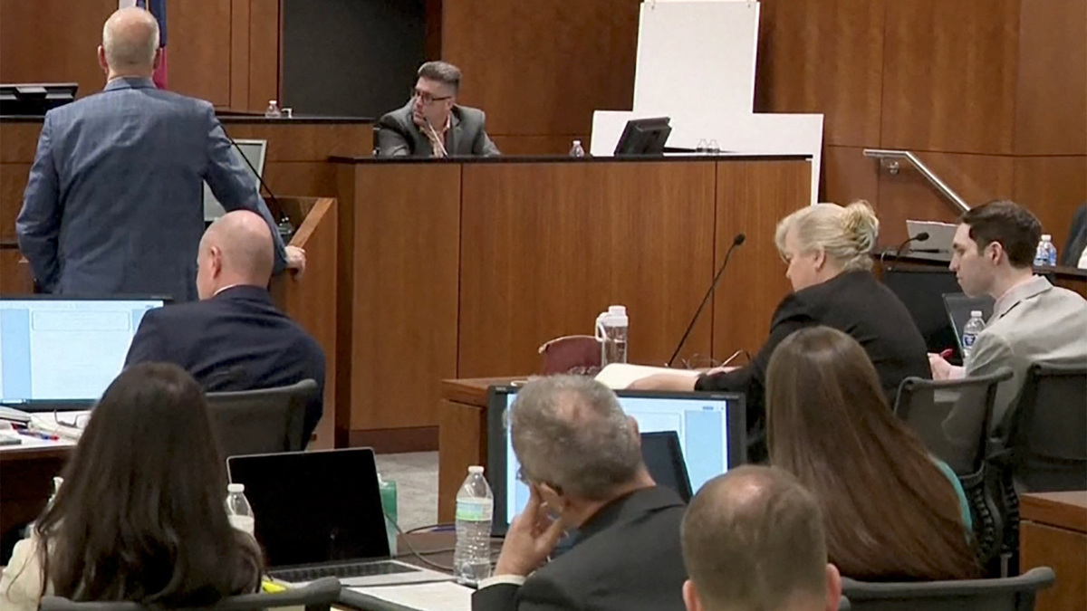 Tyler Robinson, the man accused of killing conservative activist Charlie Kirk, sits at the far right beside defense lawyer Kathryn Nester during a preliminary court hearing as Utah County prosecutor Chad Grunander questions David Hull, an investigator with the Utah Department of Safety, in Provo, Utah, on Monday.