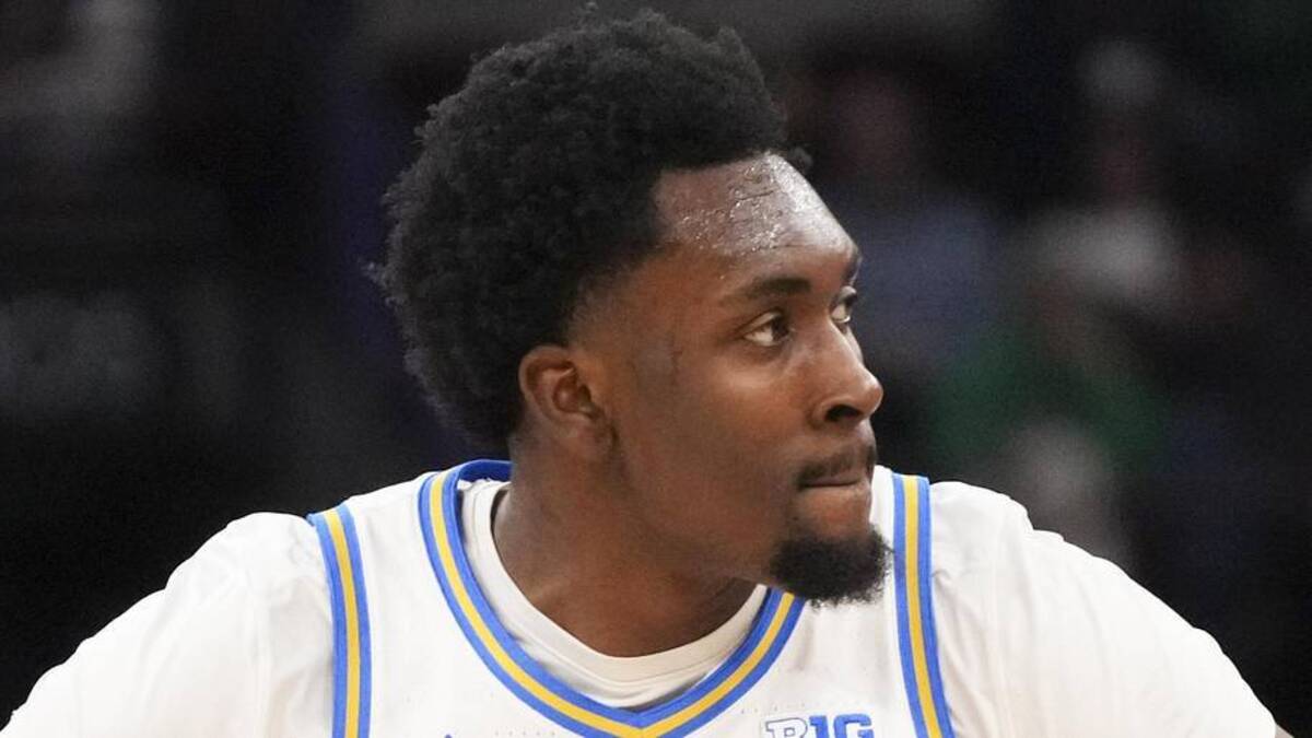  Mar 14, 2026; Chicago, IL, USA; UCLA Bruins center Xavier Booker (1) reacts after making a three point basket against the Purdue Boilermakers during the first half at United Center. Mandatory Credit: David Banks-Imagn Images | David Banks-Imagn Images 