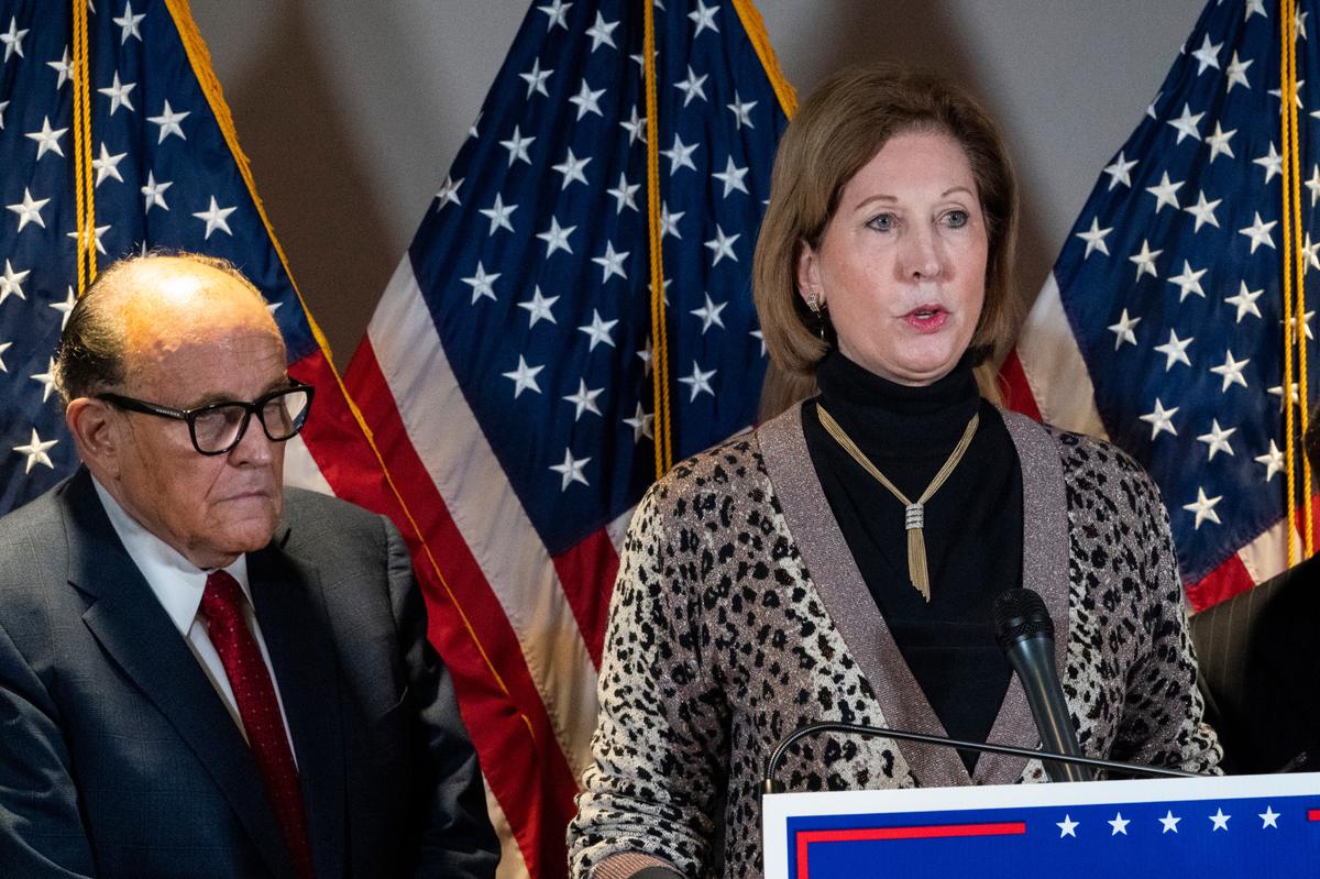 In this Nov. 19, 2020 file photo, Sidney Powell, right, speaks next to former Mayor of New York Rudy Giuliani, as members of President Donald Trump’s legal team, during a news conference at the Republican National Committee headquarters in Washington.