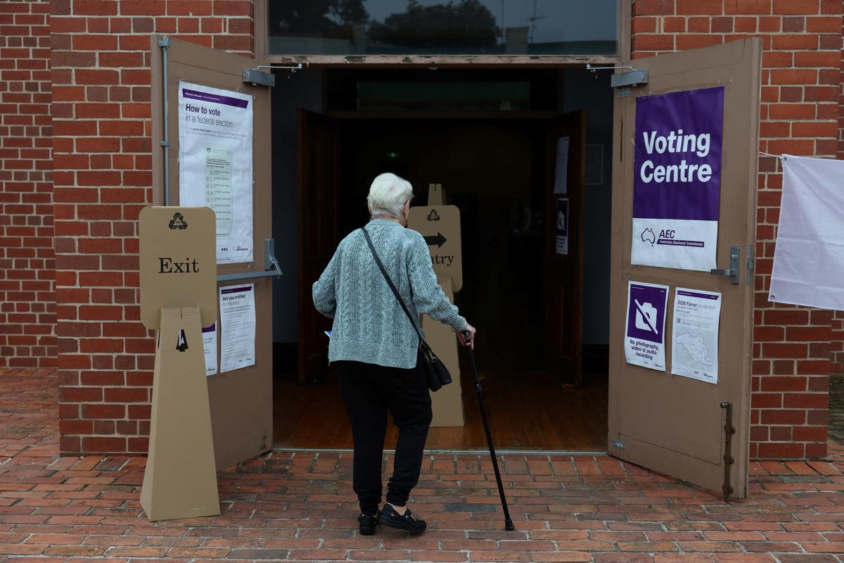 A woman enters a pre-polling centre ahead of the Farrer by-election in Corowa, Australia, May 6, 2026. REUTERS/Hollie Adams