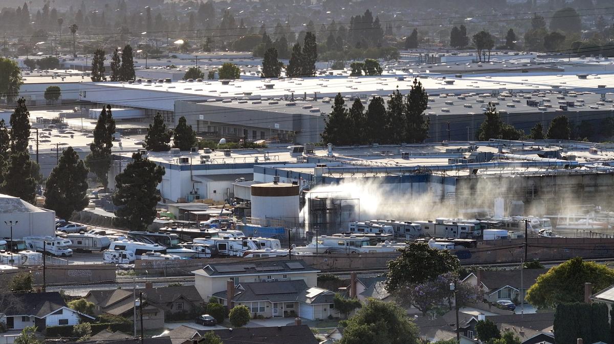 A pressurized tank filled with methyl methacrylate is sprayed with water at GKN Aerospace in Garden Grove, Calif., on Saturday, May 23, 2026. (Jeff Gritchen/The Orange County Register/TNS)