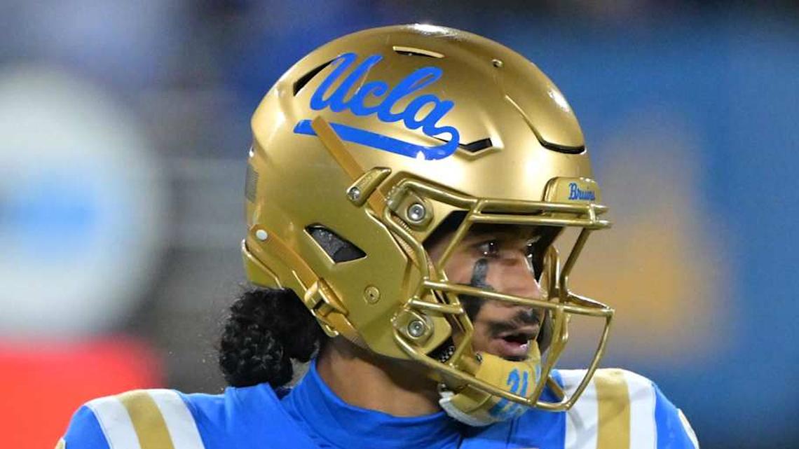  Nov 22, 2025; Pasadena, California, USA; UCLA Bruins quarterback Nico Iamaleava (9) sets to pass the ball during the first half against the Washington Huskies at the Rose Bowl. Mandatory Credit: Jayne Kamin-Oncea-Imagn Images | Jayne Kamin-Oncea-Imagn Images 