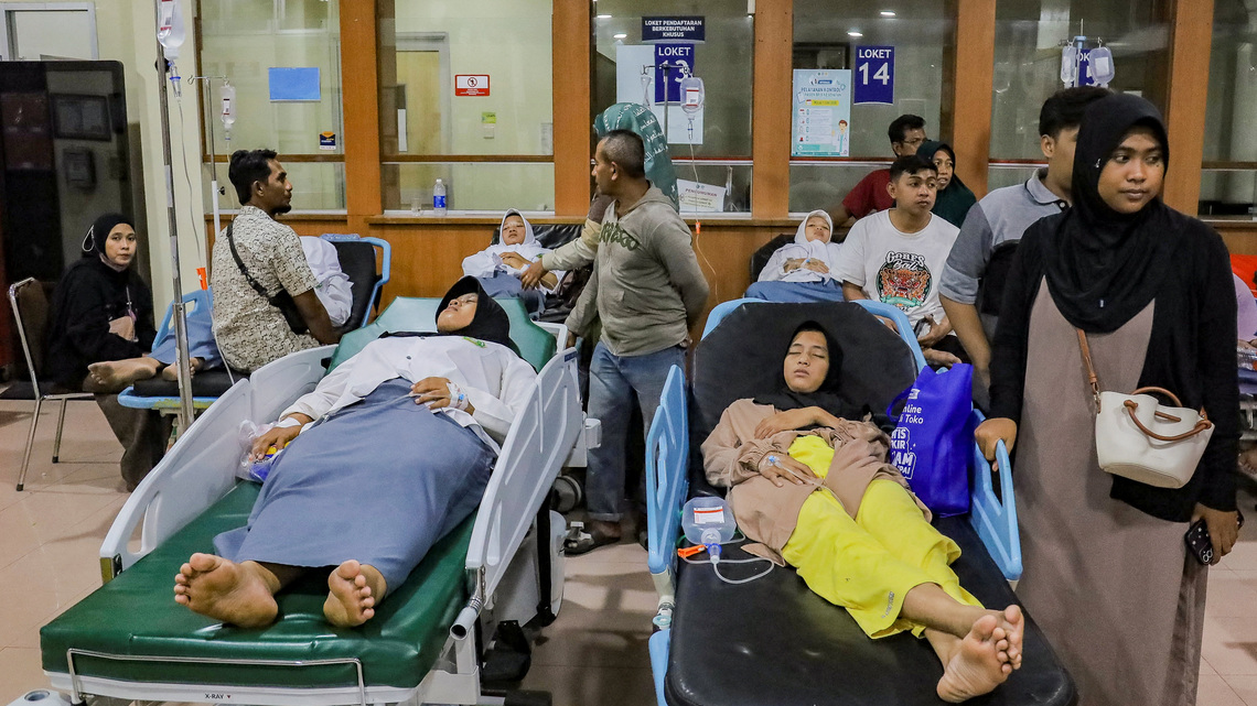 Indonesian officials suspect food poisoning from free school meal after more than 500 fall ill 