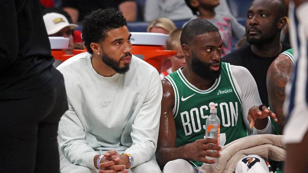  Oct 8, 2025; Memphis, Tennessee, USA; Boston Celtics forward Jayson Tatum (0) and guard Jaylen Brown (7) look on from the bench during the second quarter against the Memphis Grizzlies at FedExForum. Mandatory Credit: Petre Thomas-Imagn Images | Petre Thomas-Imagn Images 