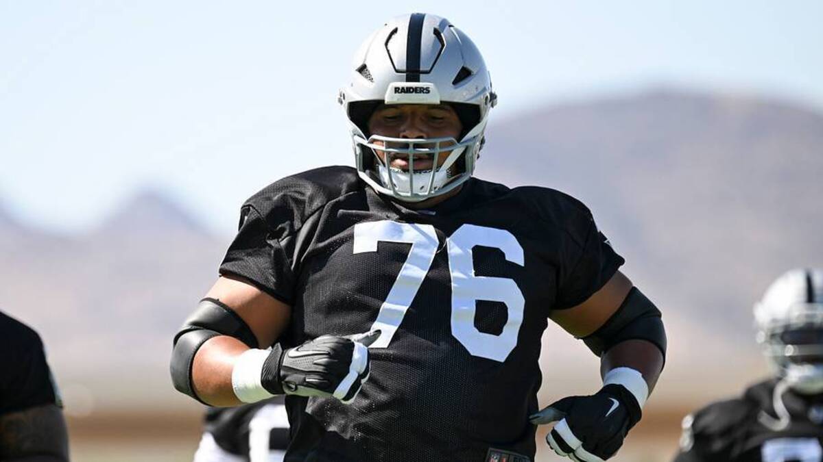  May 20, 2026; Henderson, NV, USA; Las Vegas Raiders guard Caleb Rogers (76) warms up during organized team activities at Intermountain Health Performance Center. Mandatory Credit: Candice Ward-Imagn Images | IMAGN IMAGES via Reuters Connect 