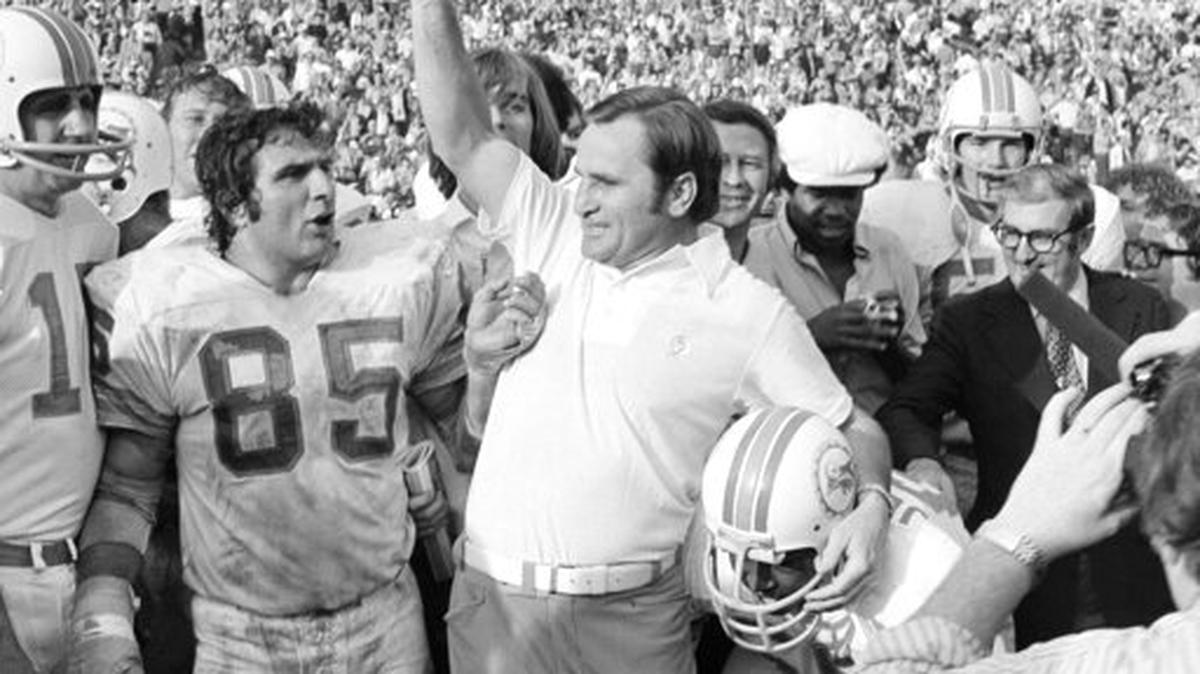FILE - In this Jan. 13, 1973, file photo, Miami Dolphins coach Don Shula lets out with a roar as the gun sounds to give his Dolphins a 14-7 Super Bowl victory over the Washington Redskins in Los Angeles. Shula coached the 1972 Dolphins to a 17-0 record.