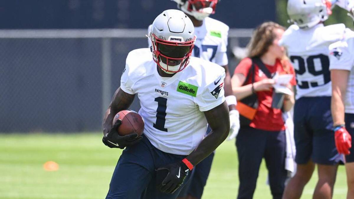  Jun 2, 2026; Foxborough, MA, USA; New England Patriots wide receiver A.J. Brown (1) runs after making a catch during the team's OTA at Gillette Stadium. Mandatory Credit: Eric Canha-Imagn Images | Eric Canha-Imagn Images 