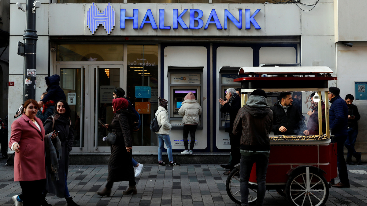 People walk past by a branch of Halkbank in central Istanbul, Turkey, January 22, 2020. REUTERS/Murad Sezer