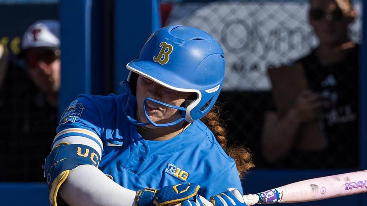  May 31, 2026; Oklahoma City, OK, USA; UCLA Bruins utility Megan Grant (43) is hit by a pitch in the first inning against the Texas Tech Red Raiders during the NCAA Women's College World Series at Devon Park. Mandatory Credit: Brett Rojo-Imagn Images | Brett Rojo-Imagn Images 
