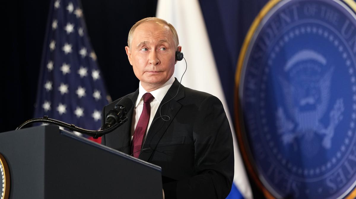 President Vladimir Putin of Russia listens as President Donald Trump speaks during a joint news conference at Joint Base Elmendorf-Richardson in Anchorage, Alaska, on Friday, Aug. 15, 2025.