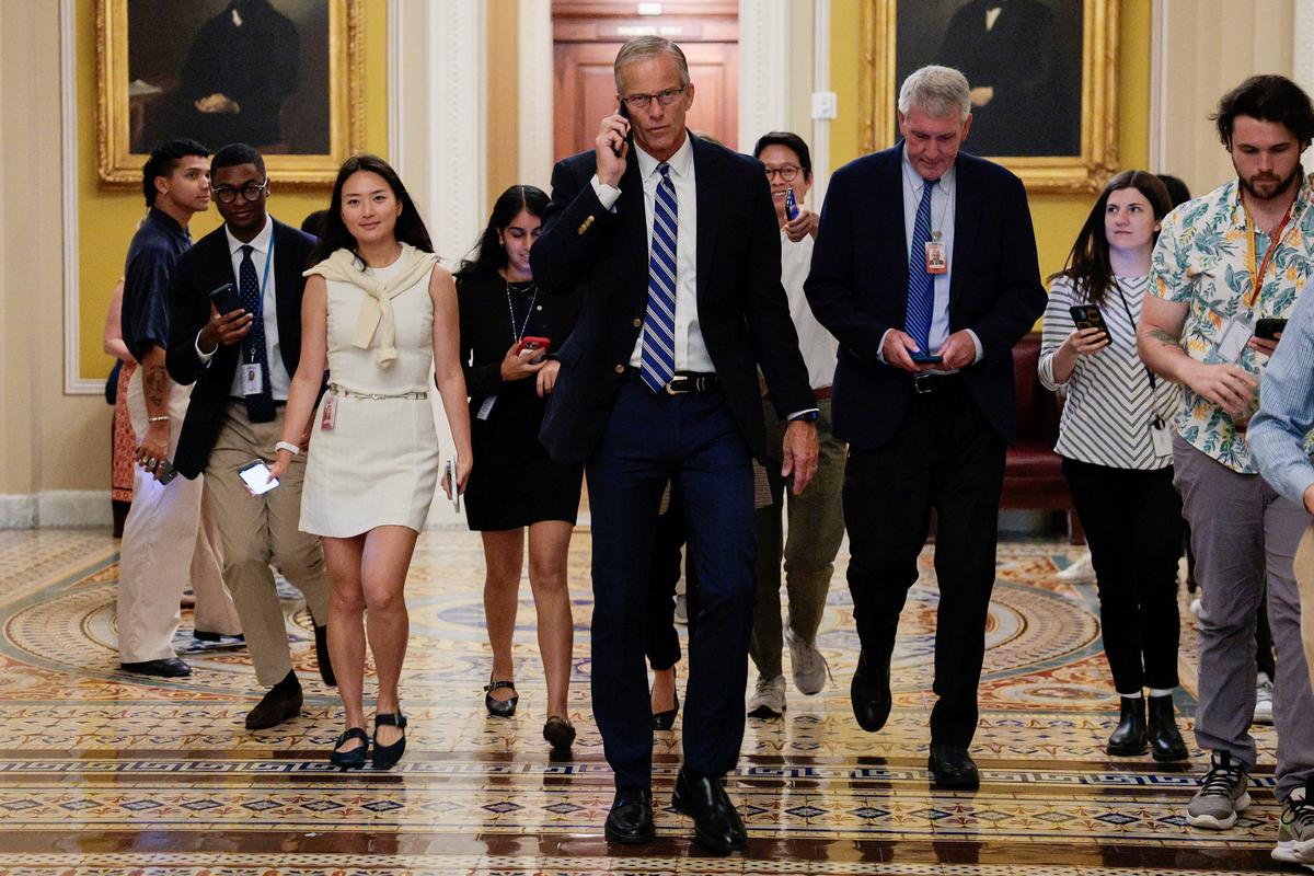 U.S. Senate Majority Leader John Thune (R-SD) uses a phone, on the day of Senate votes, on Capitol Hill in Washington, D.C., U.S., June 4, 2026. REUTERS/Evan Vucci