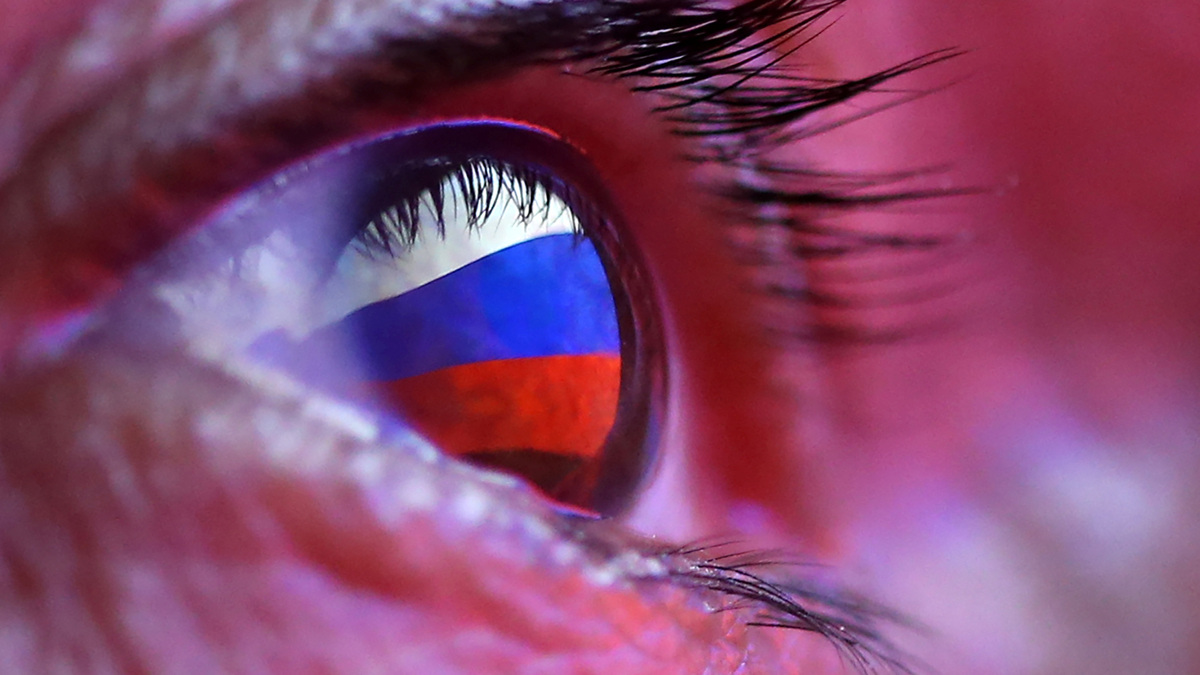 A Russian flag is reflected in an eye in this picture illustration taken October 4, 2018. REUTERS/Dado Ruvic/Illutration