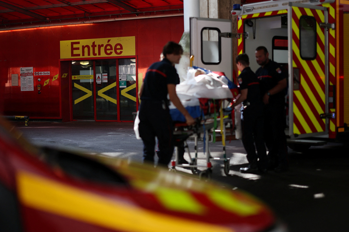 French firefighters arrive with a patient on a stretcher at the Emergency Department of the ​​Nantes CHU Hospital in Nantes, France, June 26, 2026. REUTERS/Stephane Mahe